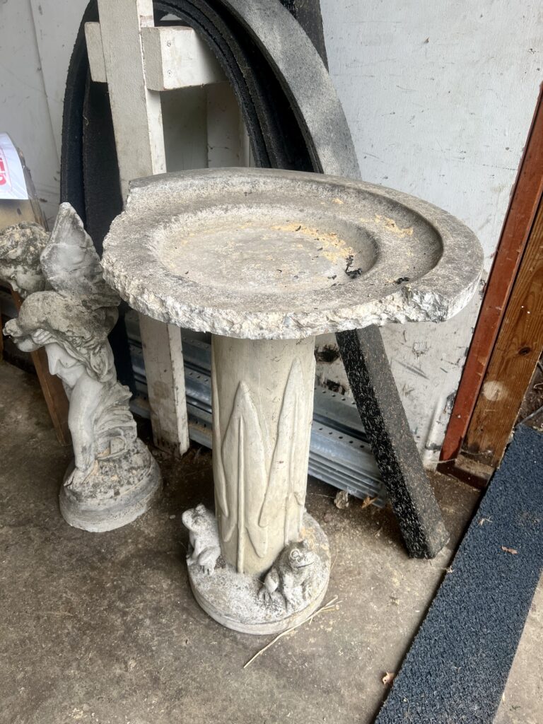 Broken basin of the bird font vandalized in 2022